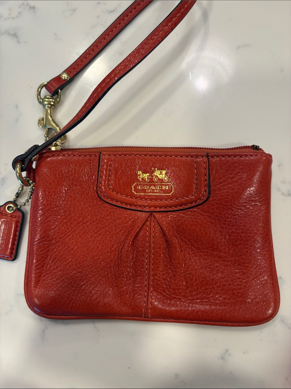 Coach terra-cotta Leather Wristlet with Gold Hardware